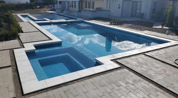 Pebble Finish pool with free form entry steps