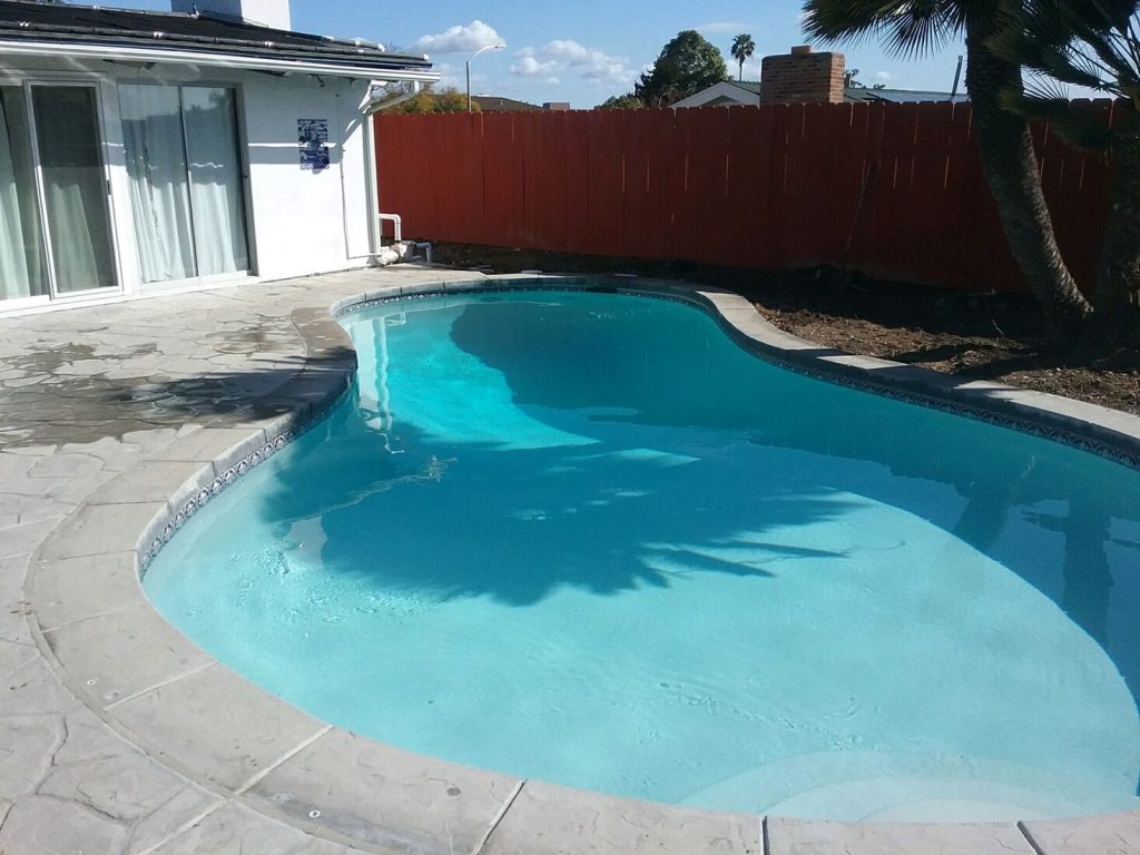 Commercial pool with stainless steel handrail