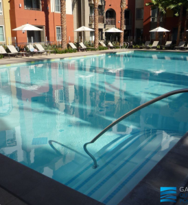 Swimming pool surface showing signs that may require pool replastering